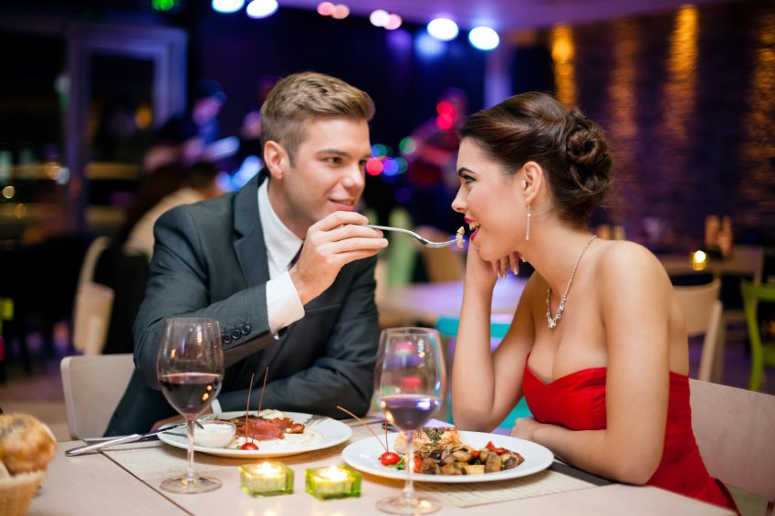 Couples sharing dessert at a local café for Valentine’s Day