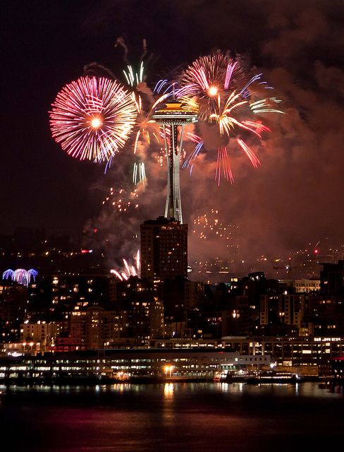 Rooftop bar in Belltown in seattle with fireworks in the background (4th of July)