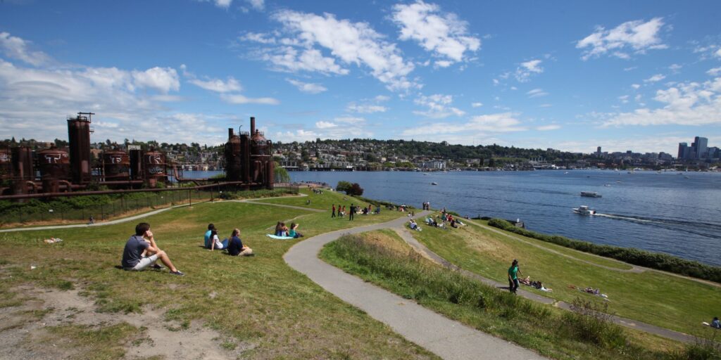 Summer picnic at Gas Works Park with views of downtown Seattle skyline